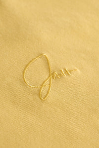 Yellow Embroidered necessi”TEE”